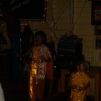 Kids dancing around midnight in a bar in Chang Mai